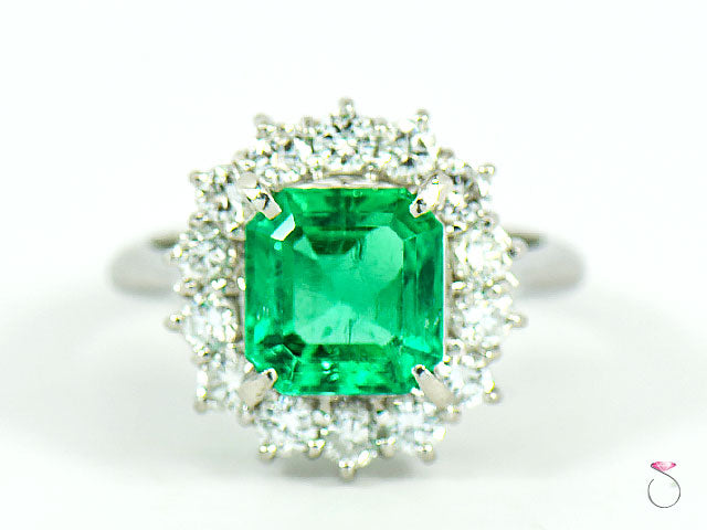 Fine Colombian Emerald & Diamond Halo Platinum Ring