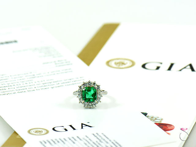 Fine Colombian Emerald & Diamond Halo Platinum Ring