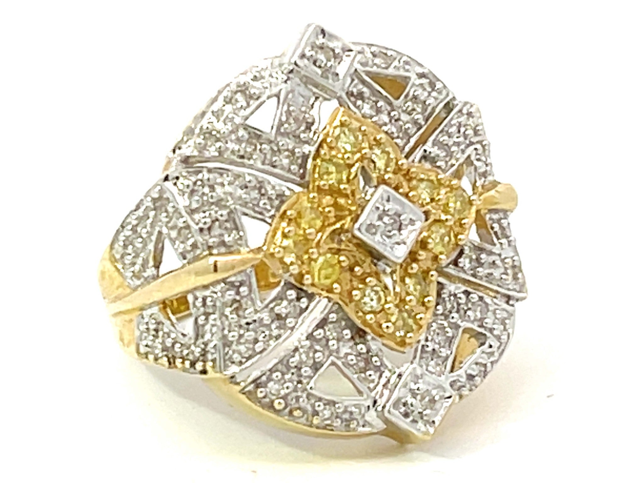 Experience luxury with our White and Fancy Yellow Diamond Leaf Dome Ring in 14k White Gold. Discover our collection at Solitaire Jewelers.