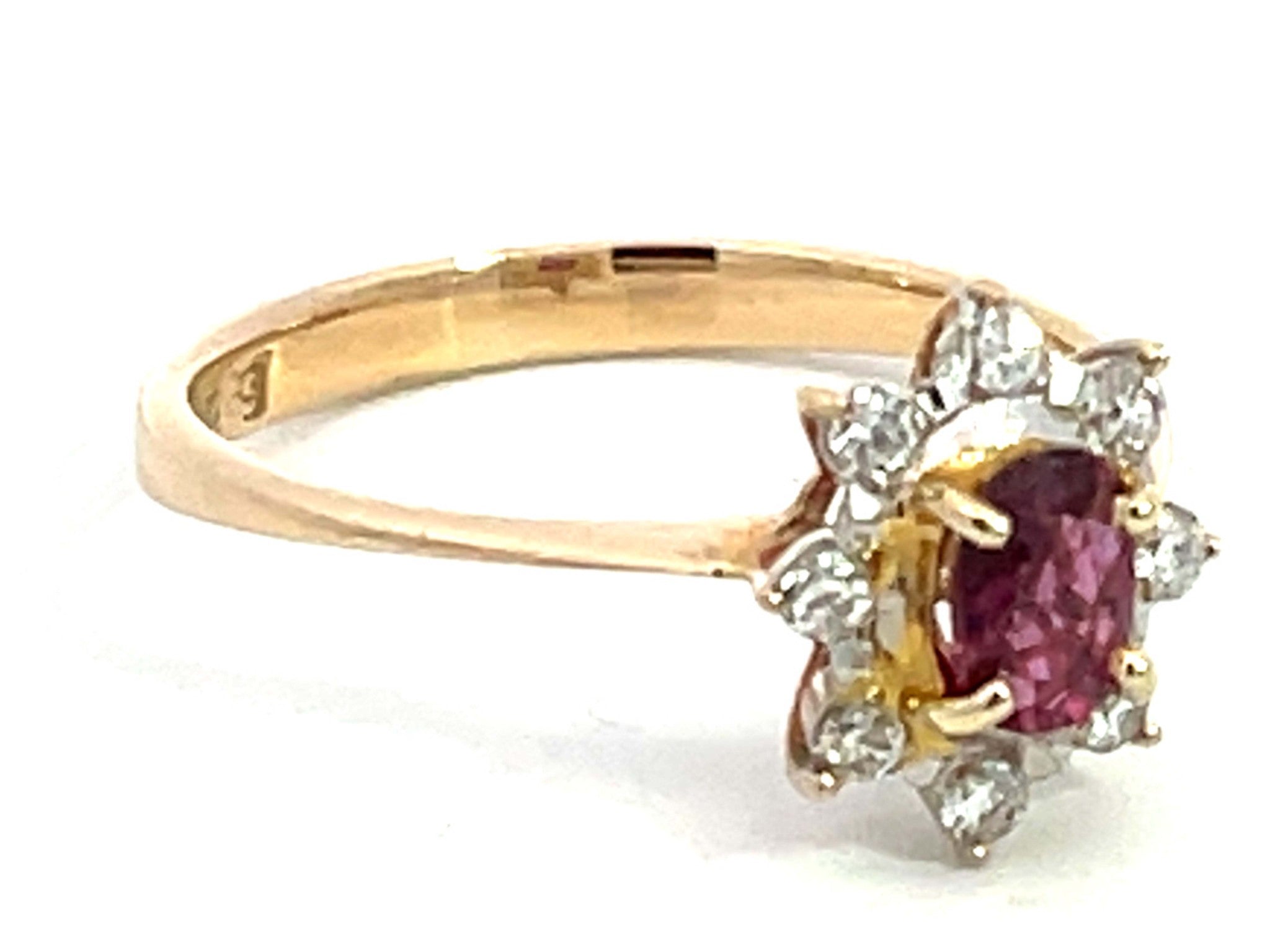 Oval Ruby and Diamond Halo Ring in 14k Yellow Gold