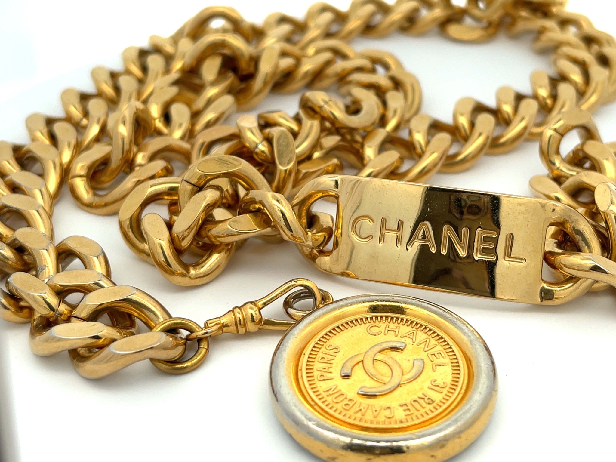 CHANEL Vintage Medallion Coin Chain Belt | Solitaire Jewelers CHANEL Vintage Medallion Coin Chain Belt | Solitaire Jewelers