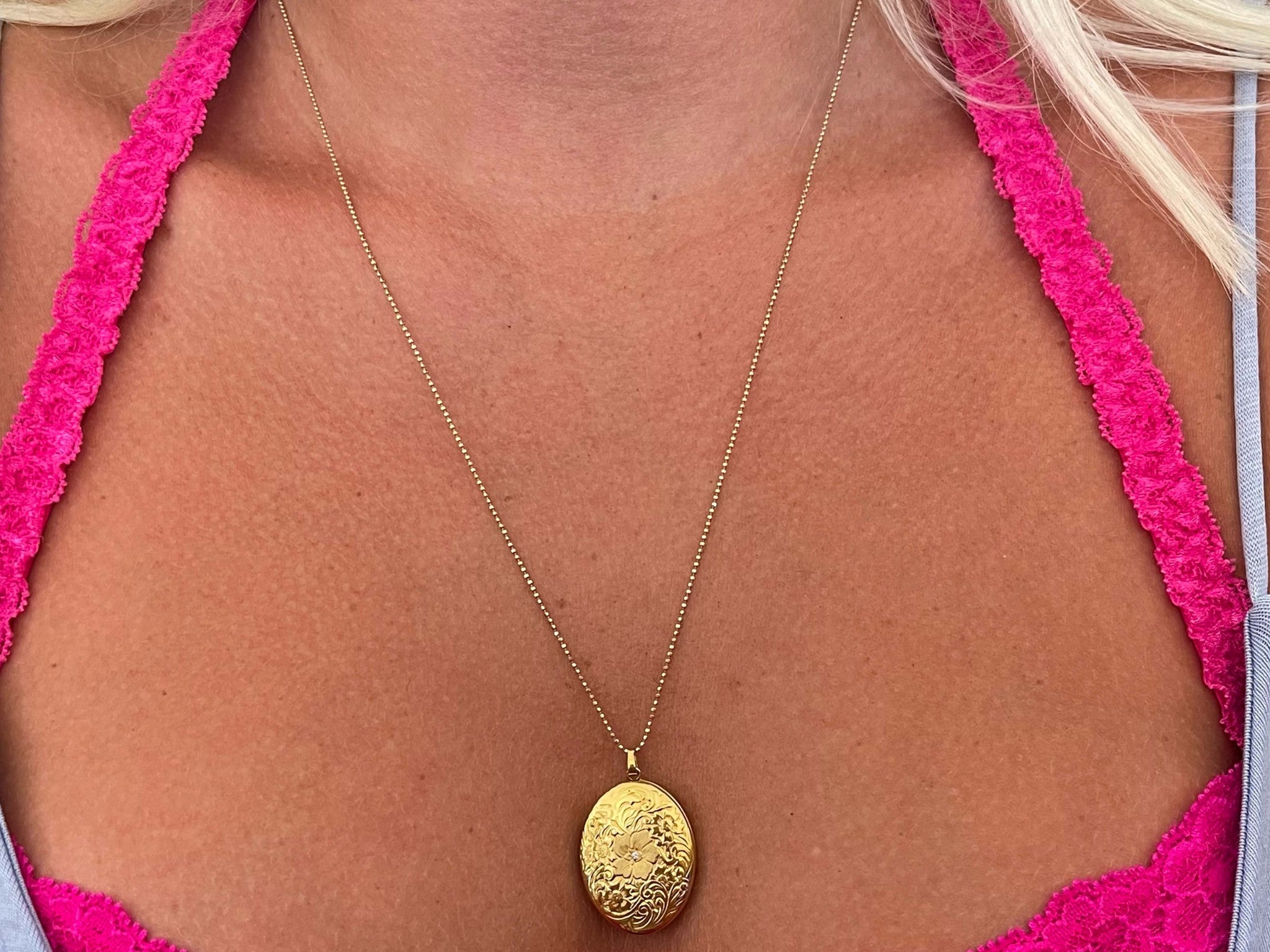 Engraved Diamond Plumeria Oval Locket Necklace in 14k Yellow Gold