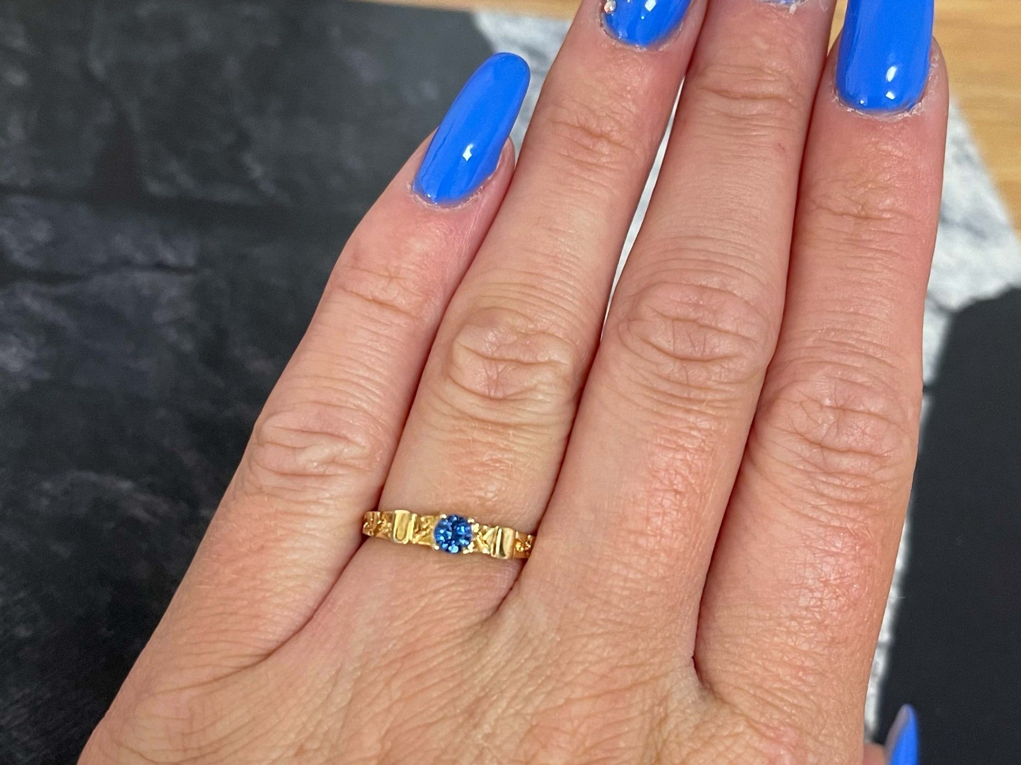Light Blue Round Sapphire Ring in 14k Yellow Gold
