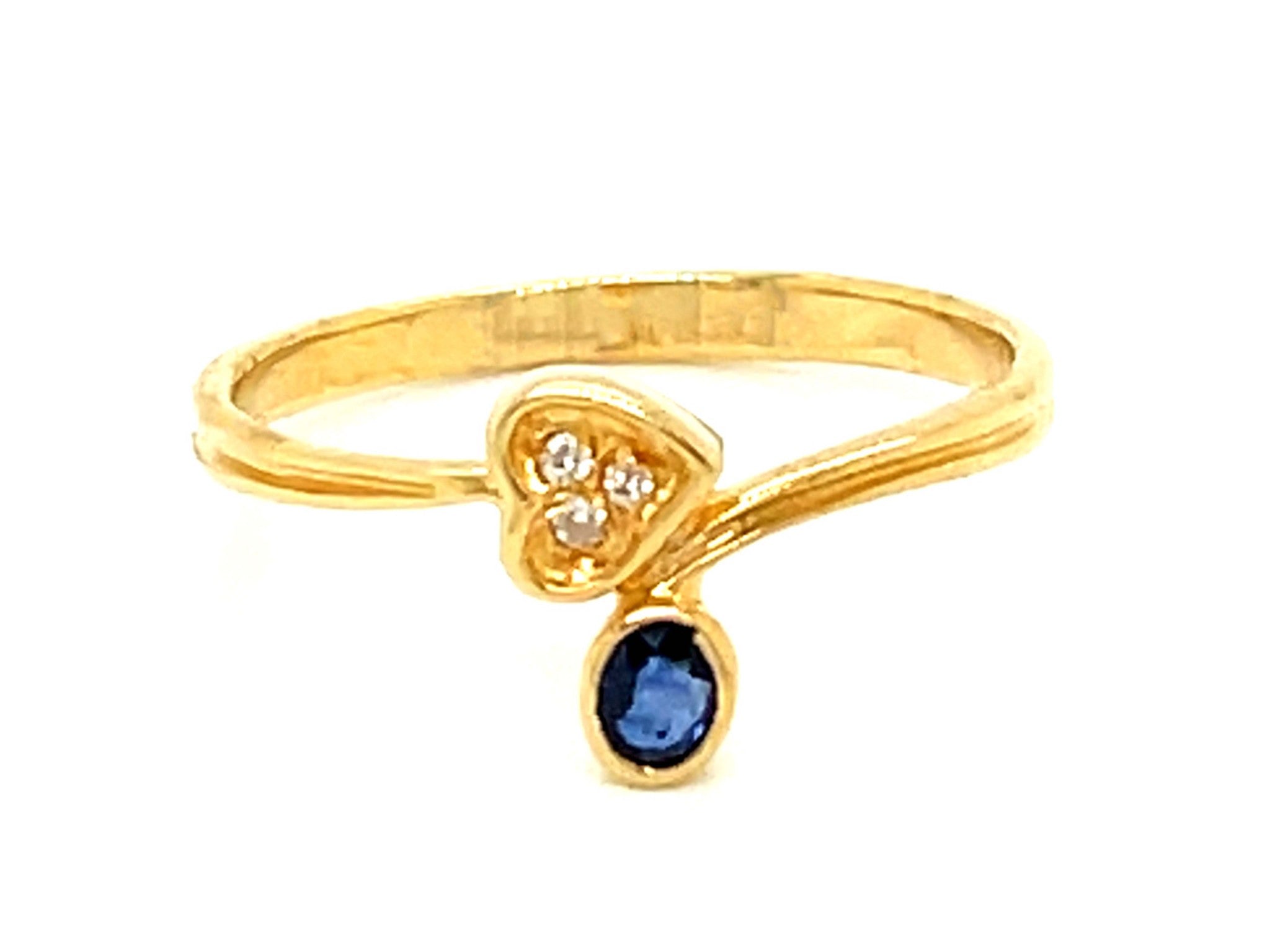 Blue Sapphire and Diamond Heart Ring in 14k Yellow Gold