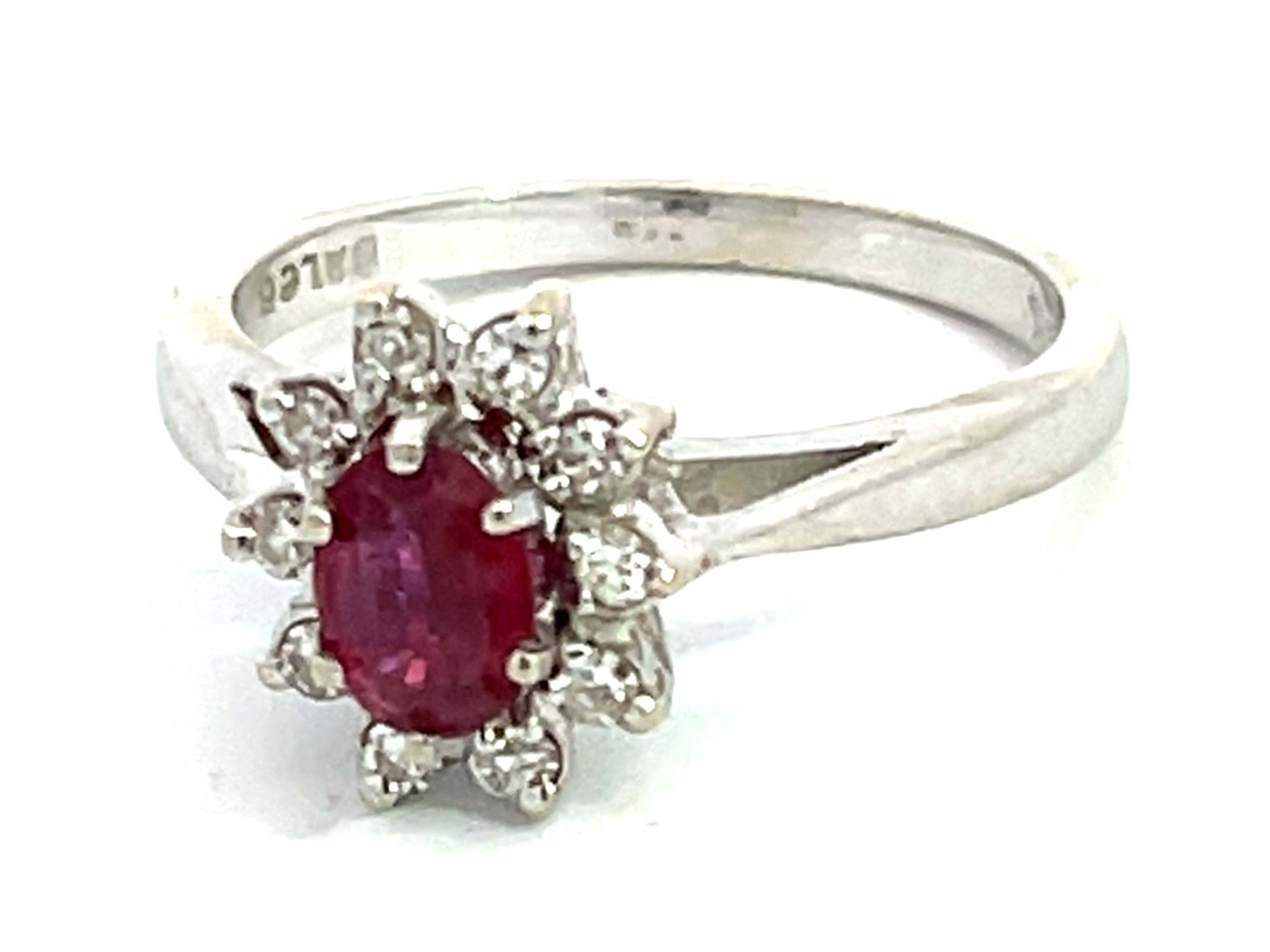 Oval Ruby and Diamond Halo Ring in 14k White Gold