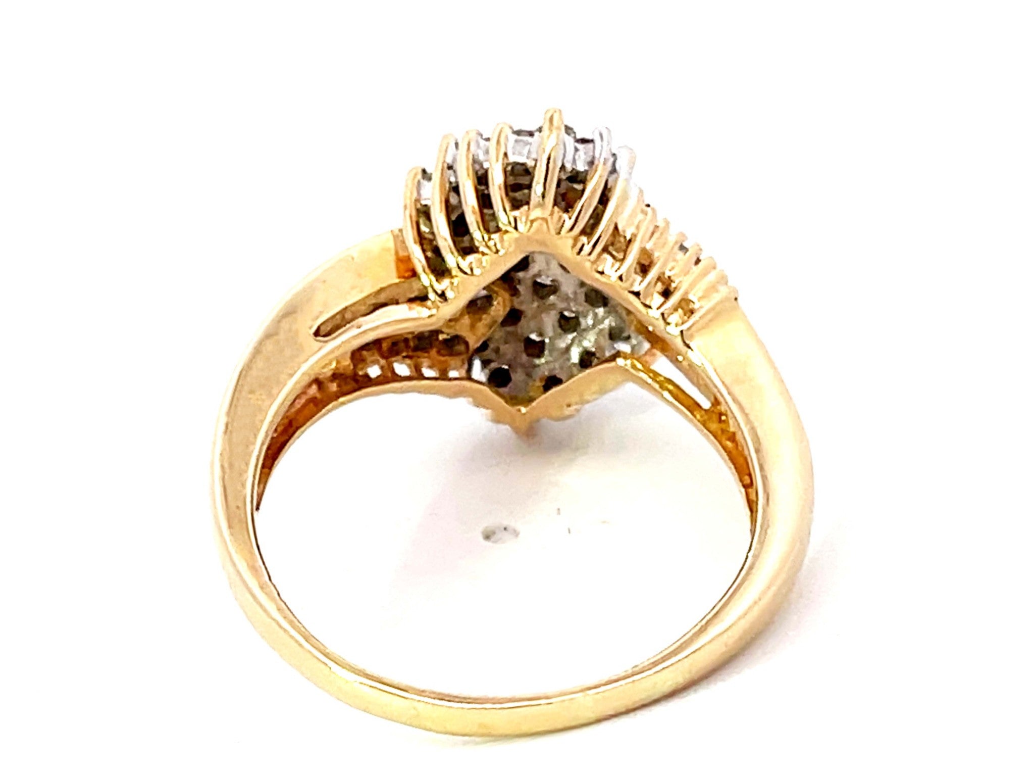 Baguette and Brilliant Cut Diamond Twist Ring in 14K Yellow Gold