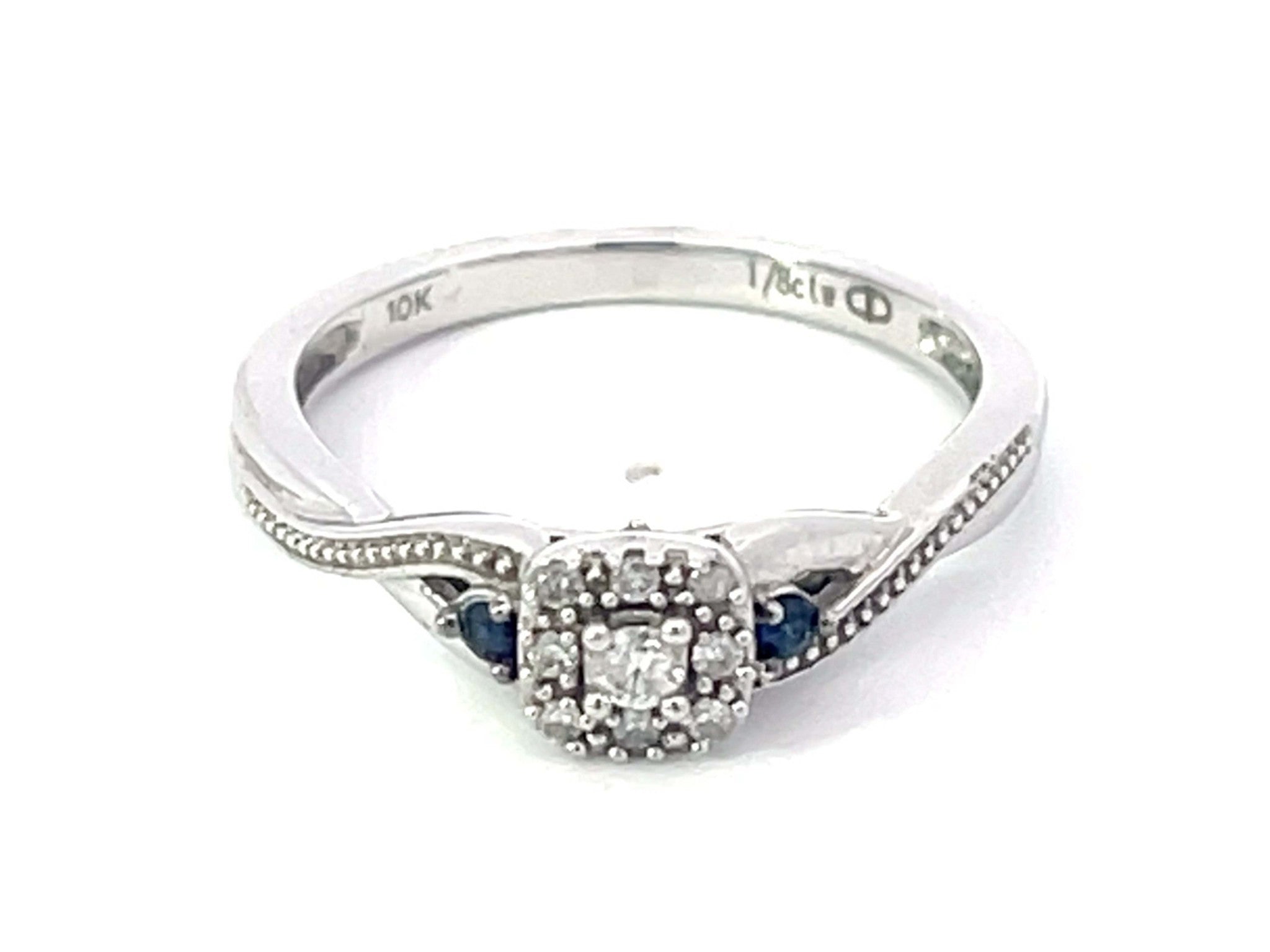 Diamond Halo and Sapphire Ring in 10k White Gold