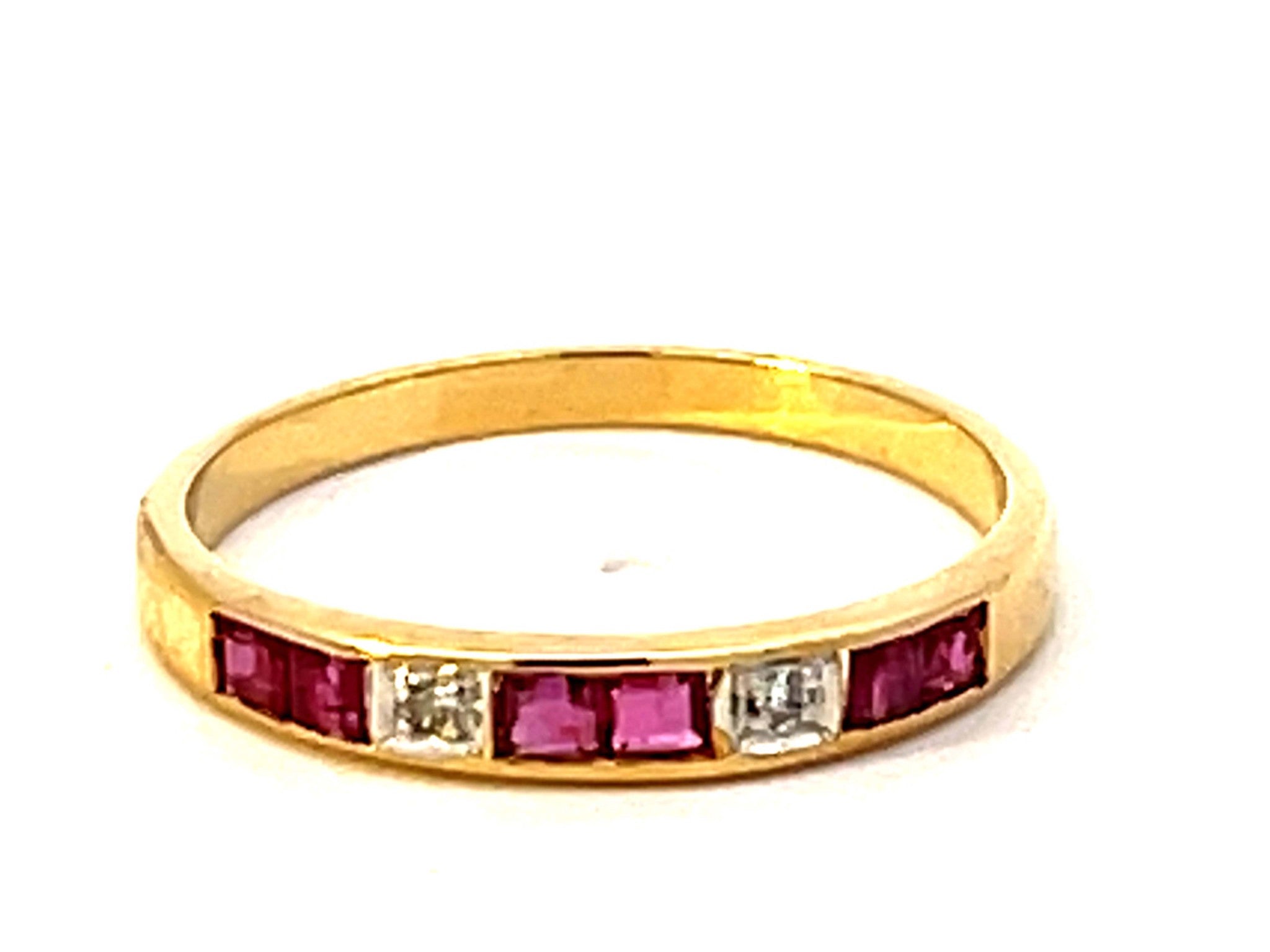 Channel Set Rubies and Diamond Band Ring in 14k Yellow Gold