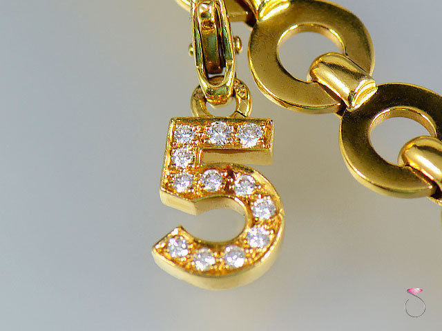 Authentic Chanel No 5 Charm in diamonds 18K yellow gold