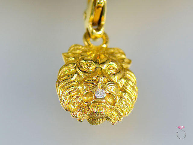 18K yellow gold Chanel Lion charm with two diamonds on the front and back